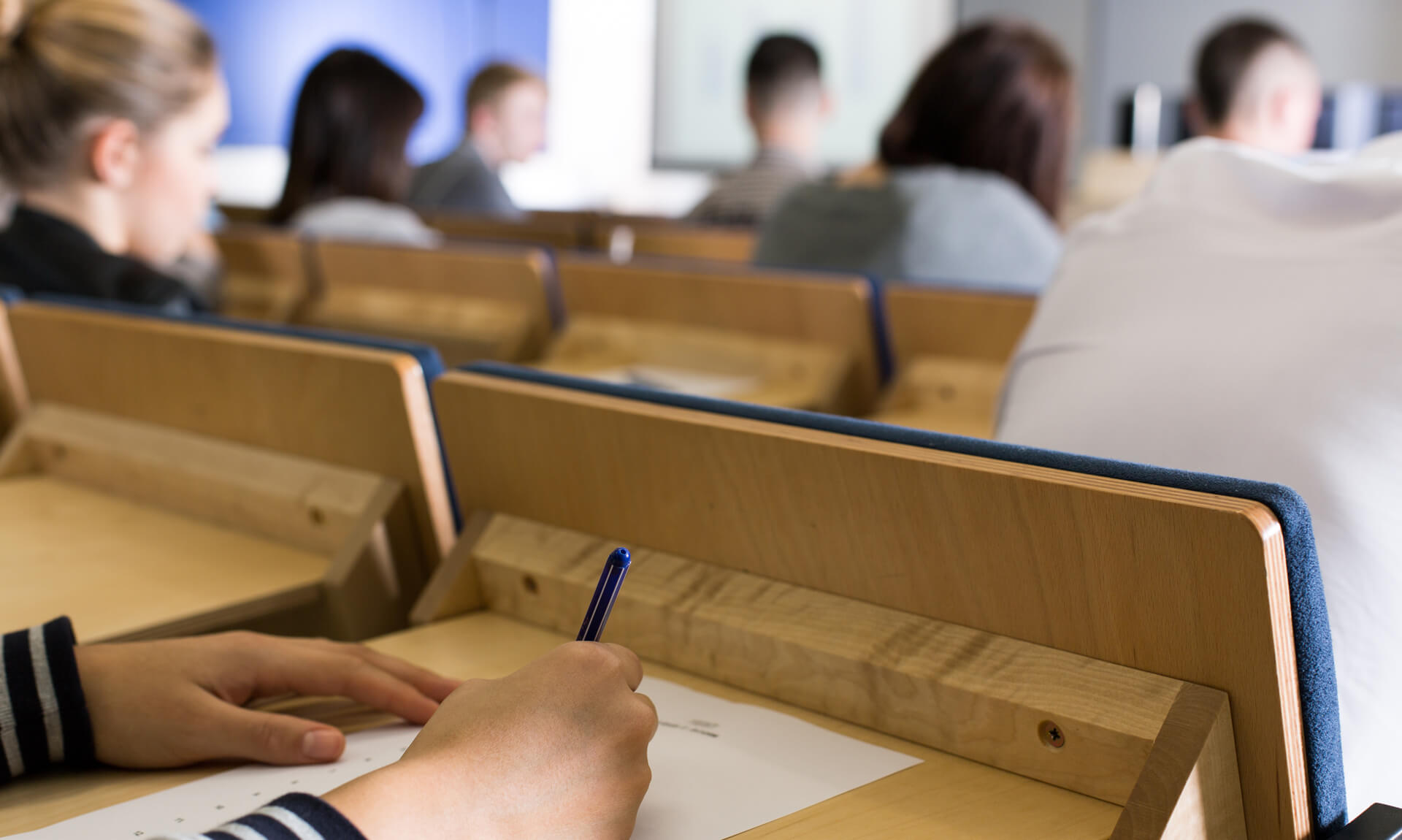 Students taking an exam.